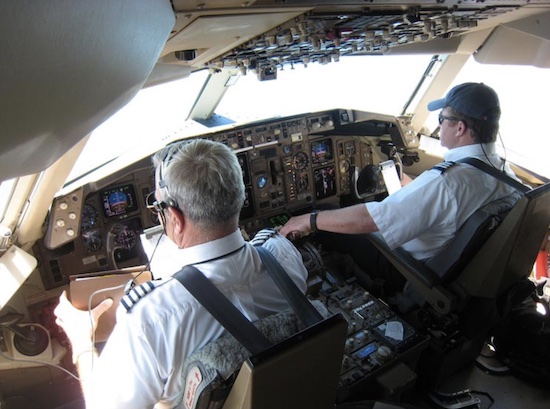 Pilot and co-pilot in the cockpit of a 767